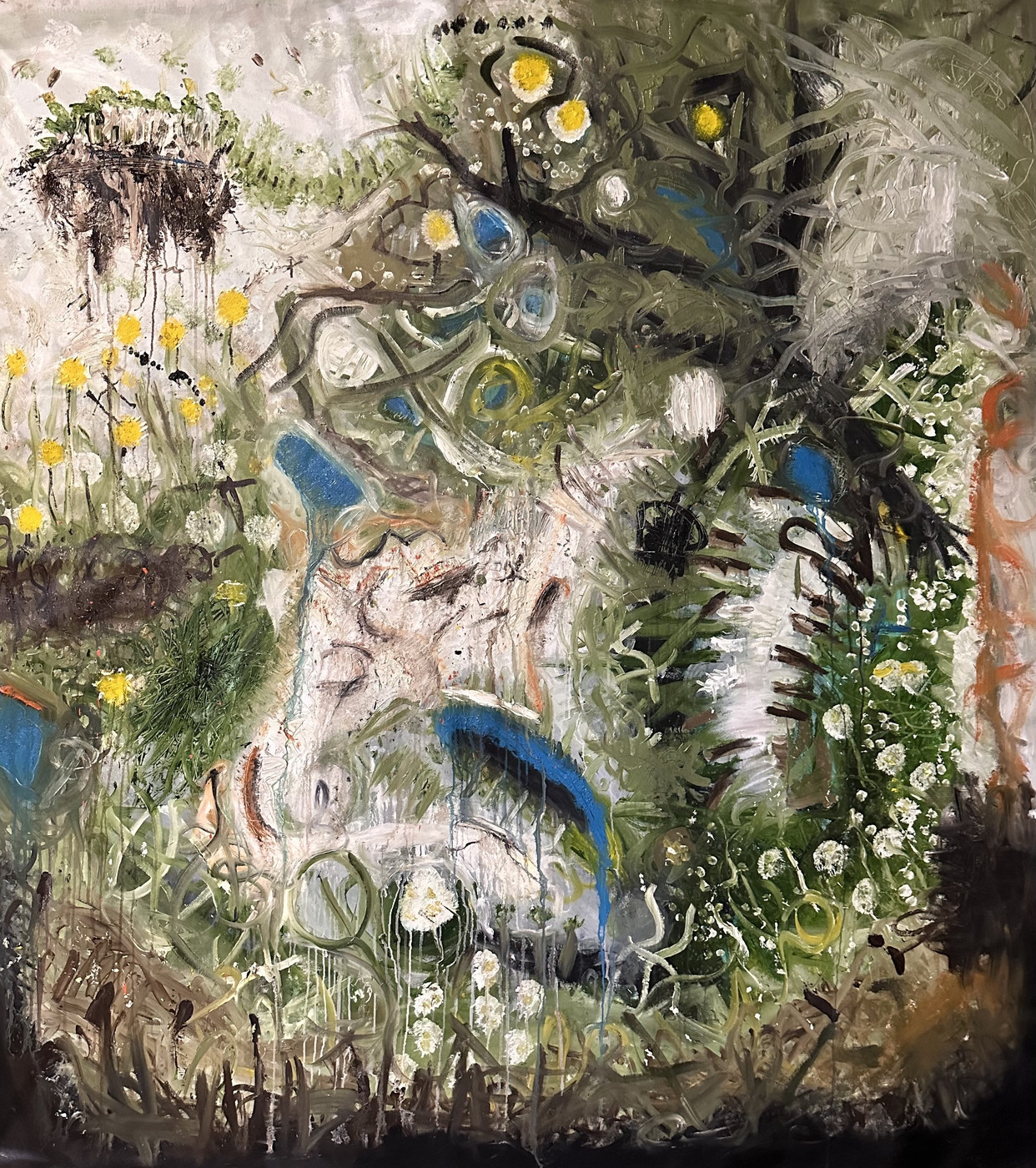 Abstract landscape painting: a meadow of yellow dandelions and white seed heads on the left beneath a floating clod of dark earth, a pale central waterfall-like passage with blue strokes and drips, and a dense tangle of olive-green grasses, white daisies, black branches and swirling white strokes on the right